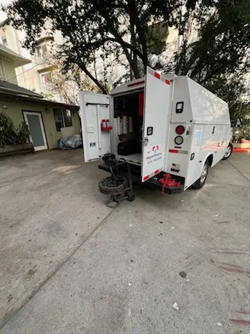 Magnet Plumbing service vehicle on-site for Sewer Line Repair in Sterling